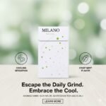 ซองบุหรี่ Milano Menthol สีขาวดีไซน์ทันสมัยพร้อมลวดลายสีเขียวมิ้นต์ วางบนพื้นโต๊ะไม้ท่ามกลางบรรยากาศธรรมชาติที่ผ่อนคลาย