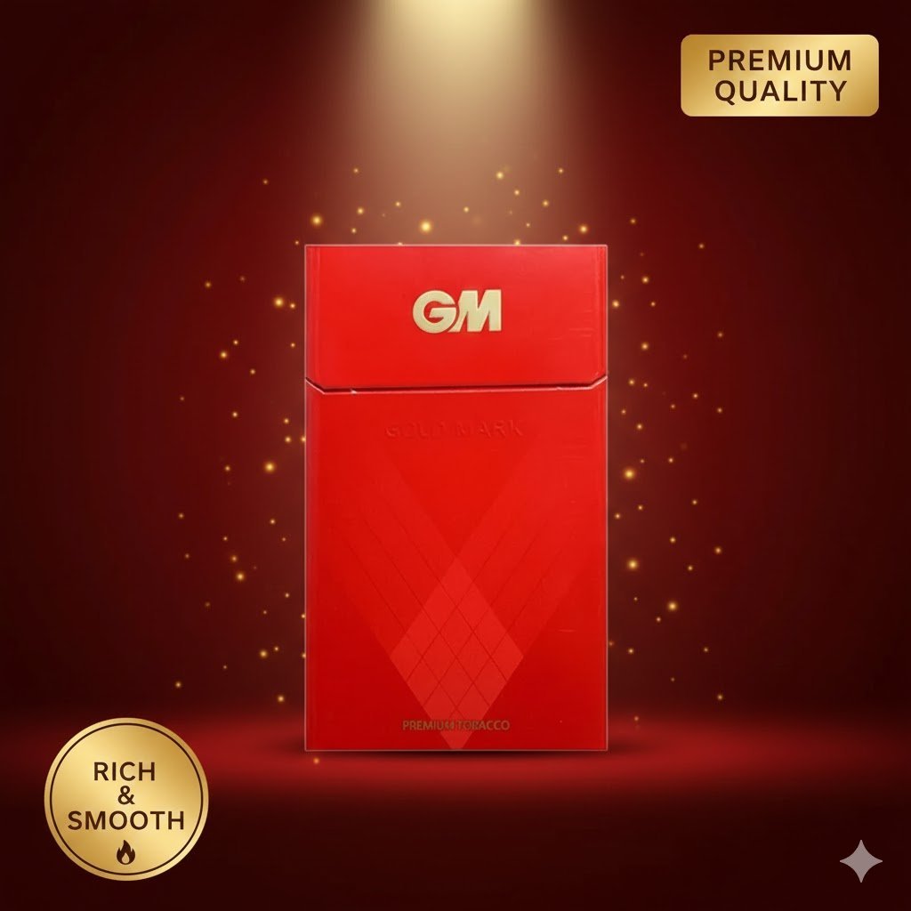 ซองบุหรี่ Gm Gold Mark ซองแข็งสีแดงสดประดับอักษรทอง วางตั้งเด่นภายใต้แสงสปอตไลท์และละอองแสงระยิบระยับ พร้อมป้าย Premium Quality และ Rich & Smooth